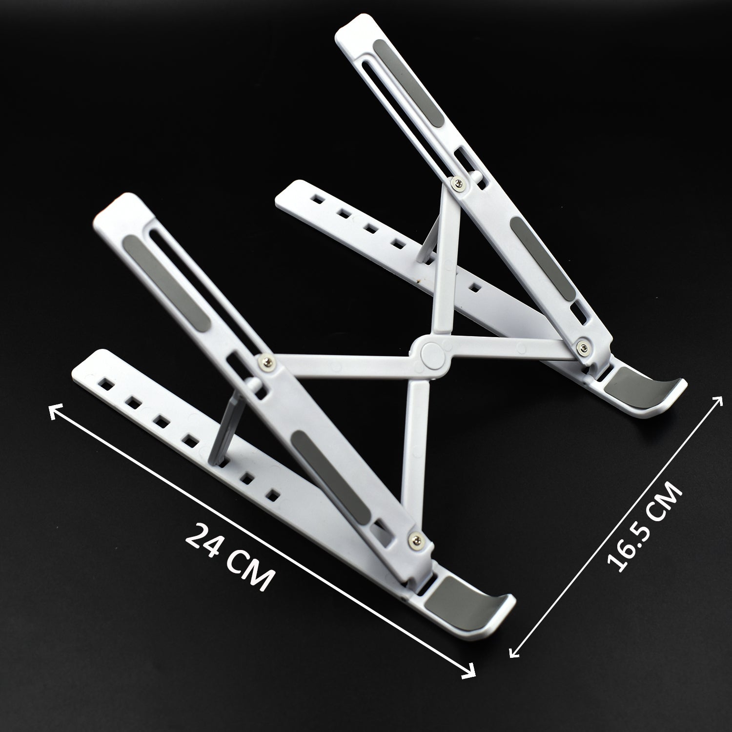 Ergonomic laptop riser with adjustable height Ergonomic laptop riser with adjustable height